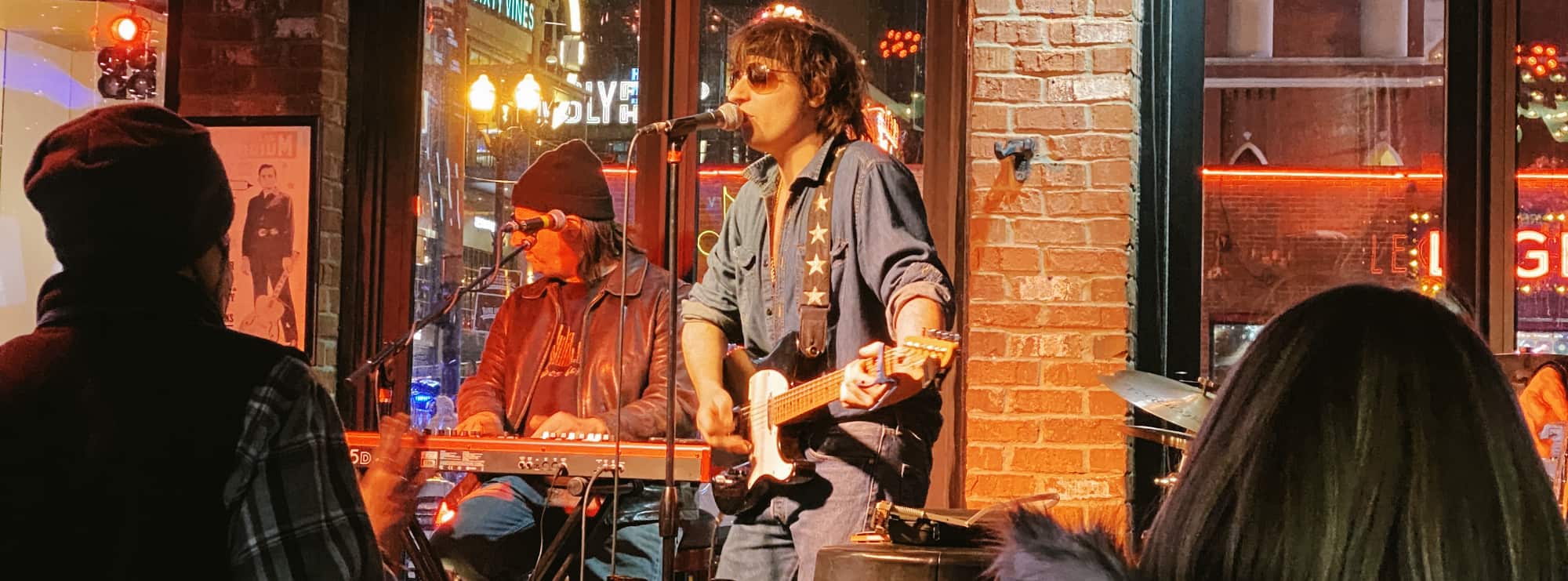 bar singer on guitar in Palm Springs