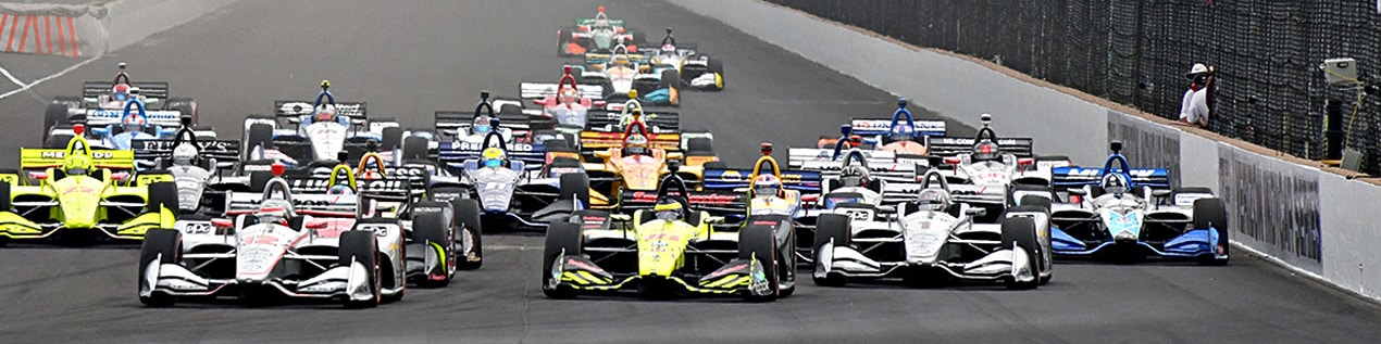 indy cars racing to through the start line Palm Springs